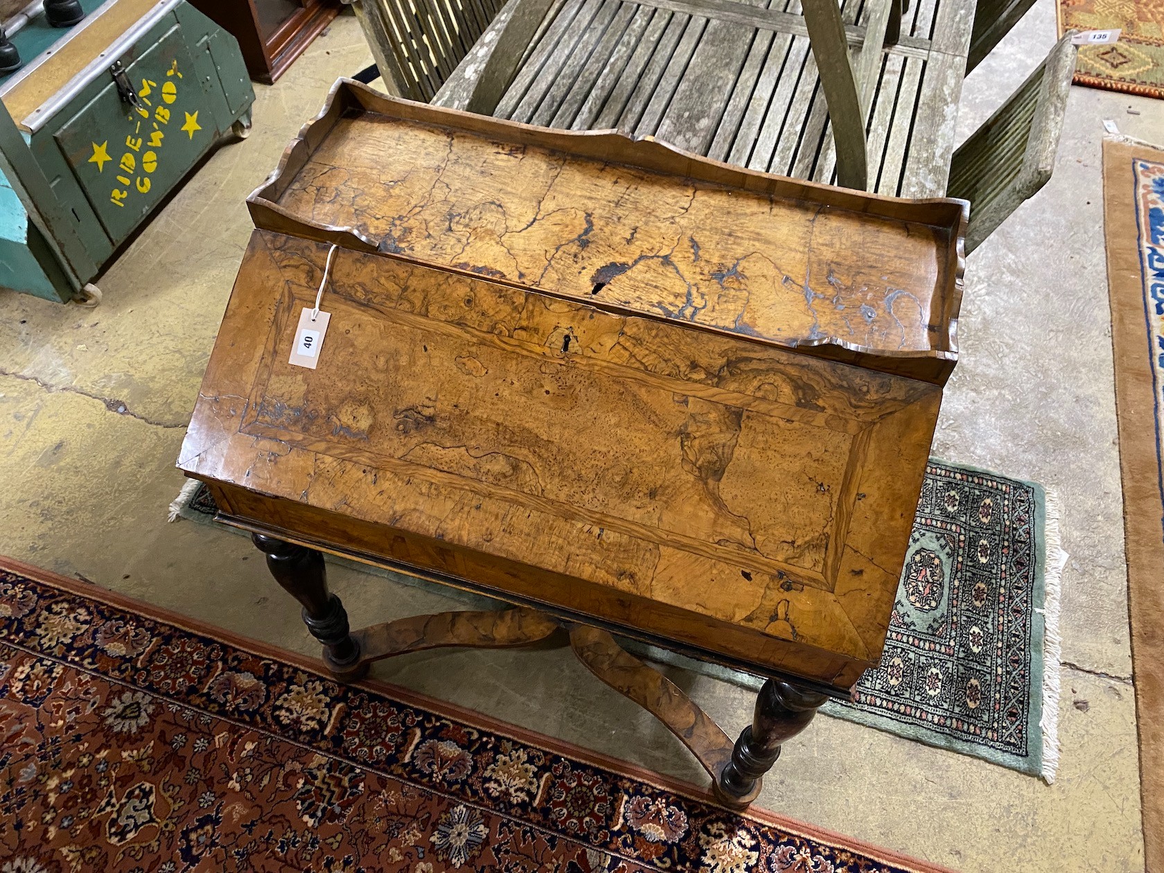 An 18th century Dutch figured walnut bureau with 'X' stretcher, width 84cm, depth 53cm, height 100cm